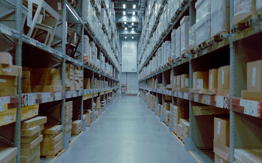 Warehouse aisle with stocked shelves